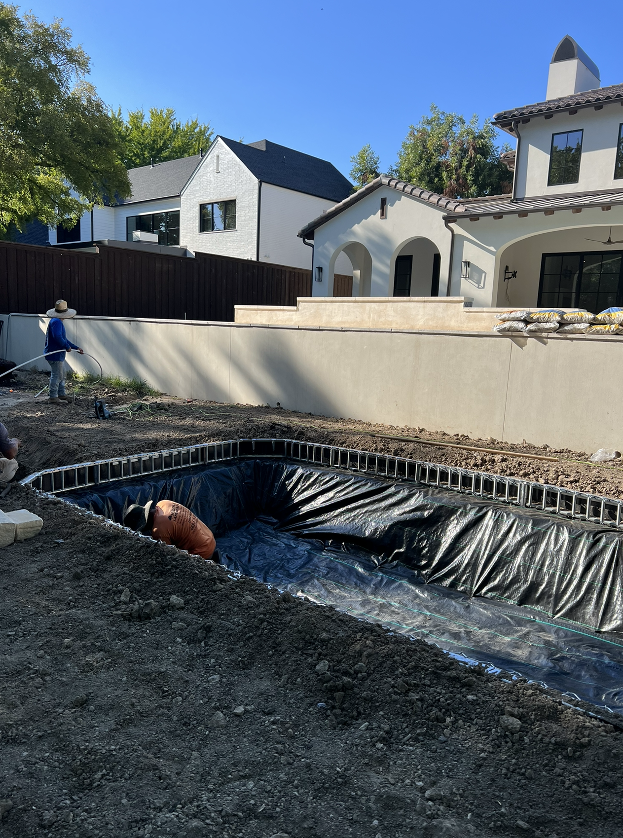 Inground trampoline installation using water pump