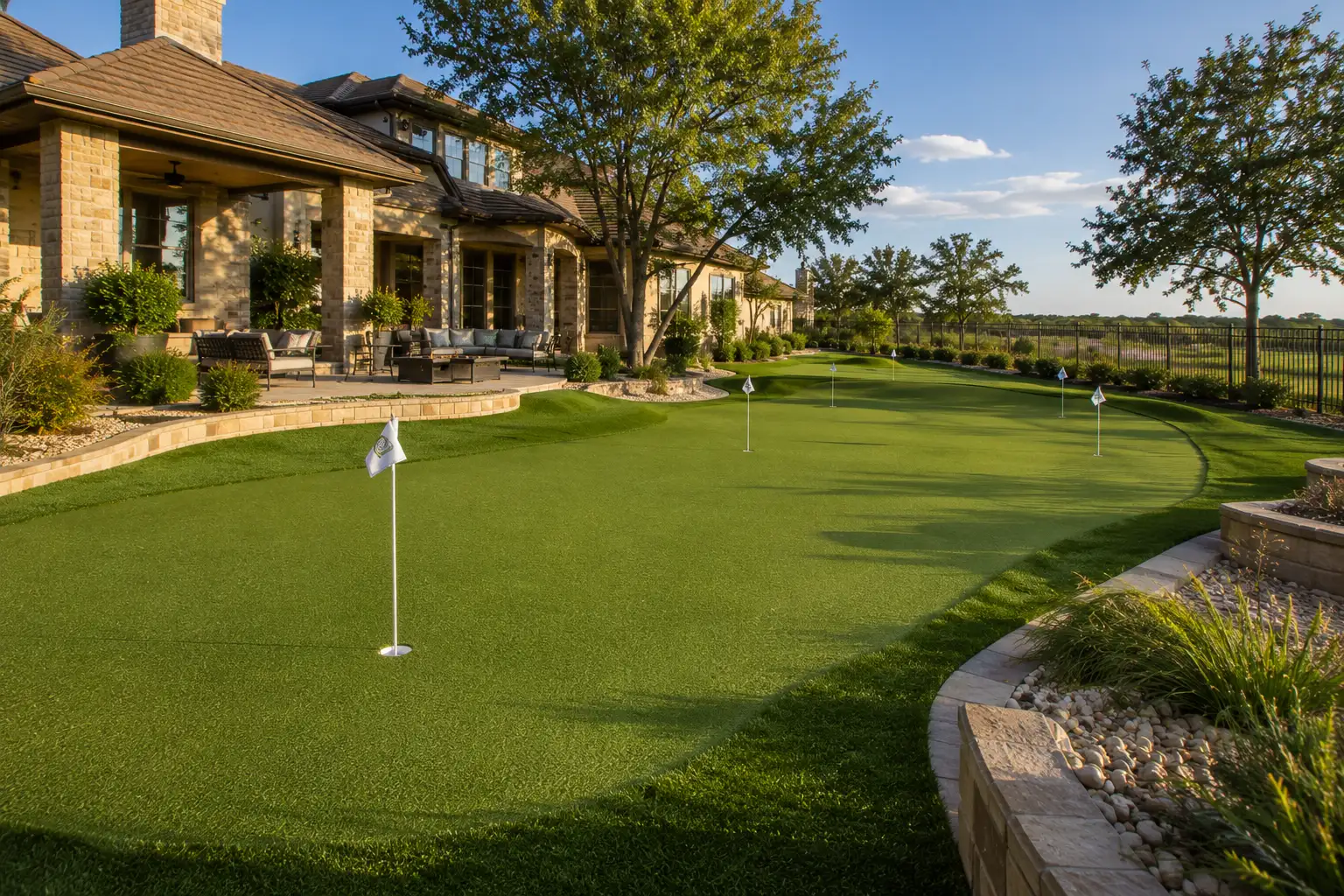 Custom multi-hole backyard putting green installation in Southlake TX by Medina Landscape