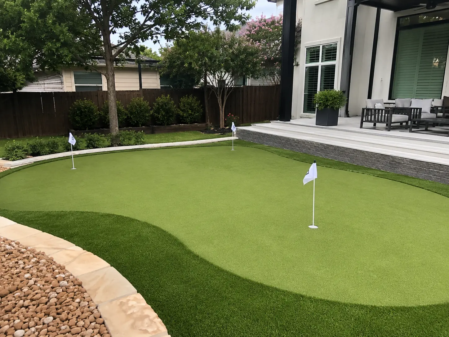 Backyard putting green installation in McKinney TX by Medina Landscape