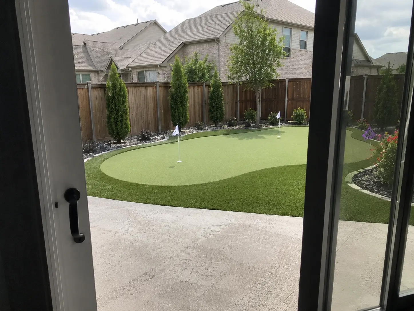 Custom backyard putting green installation in Allen TX by Medina Landscape